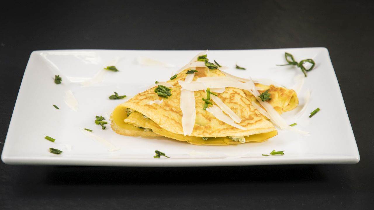 Crepes ricotta e spinaci con fonduta di Provolone Valpadana DOP dolce